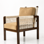 Solace Lounge Chair three-quarter view with tan cushions and rope-wrapped wood frame