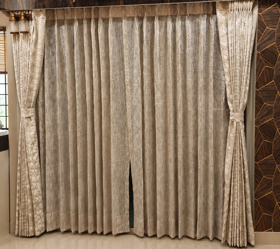 Premium sheer curtains installed by Avikar Furniture & Furnishings in a living room in Kolkata.