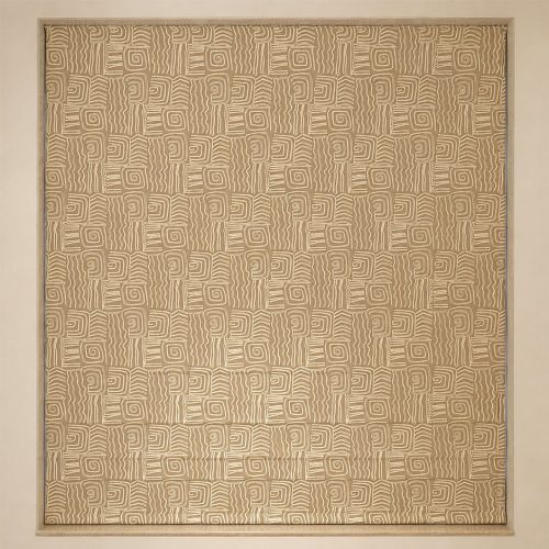 Tan roman blind with spiral geometric pattern in a window recess