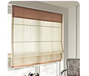 Striped roman blind in a cozy reading nook with a floral armchair