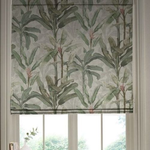 Tropical banana leaf print roman blind with pink heliconia flowers