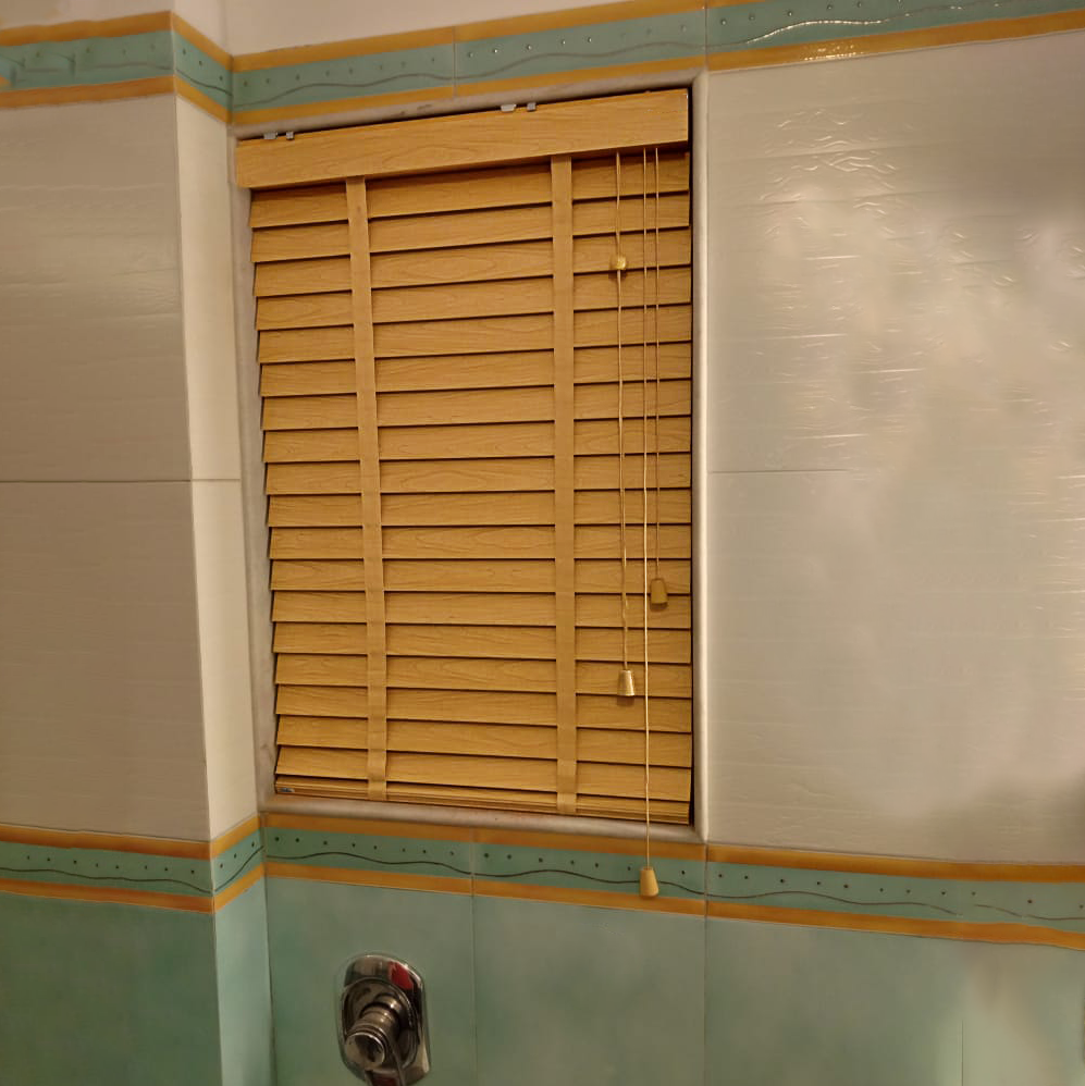Wooden blinds by Avikar Kolkata
